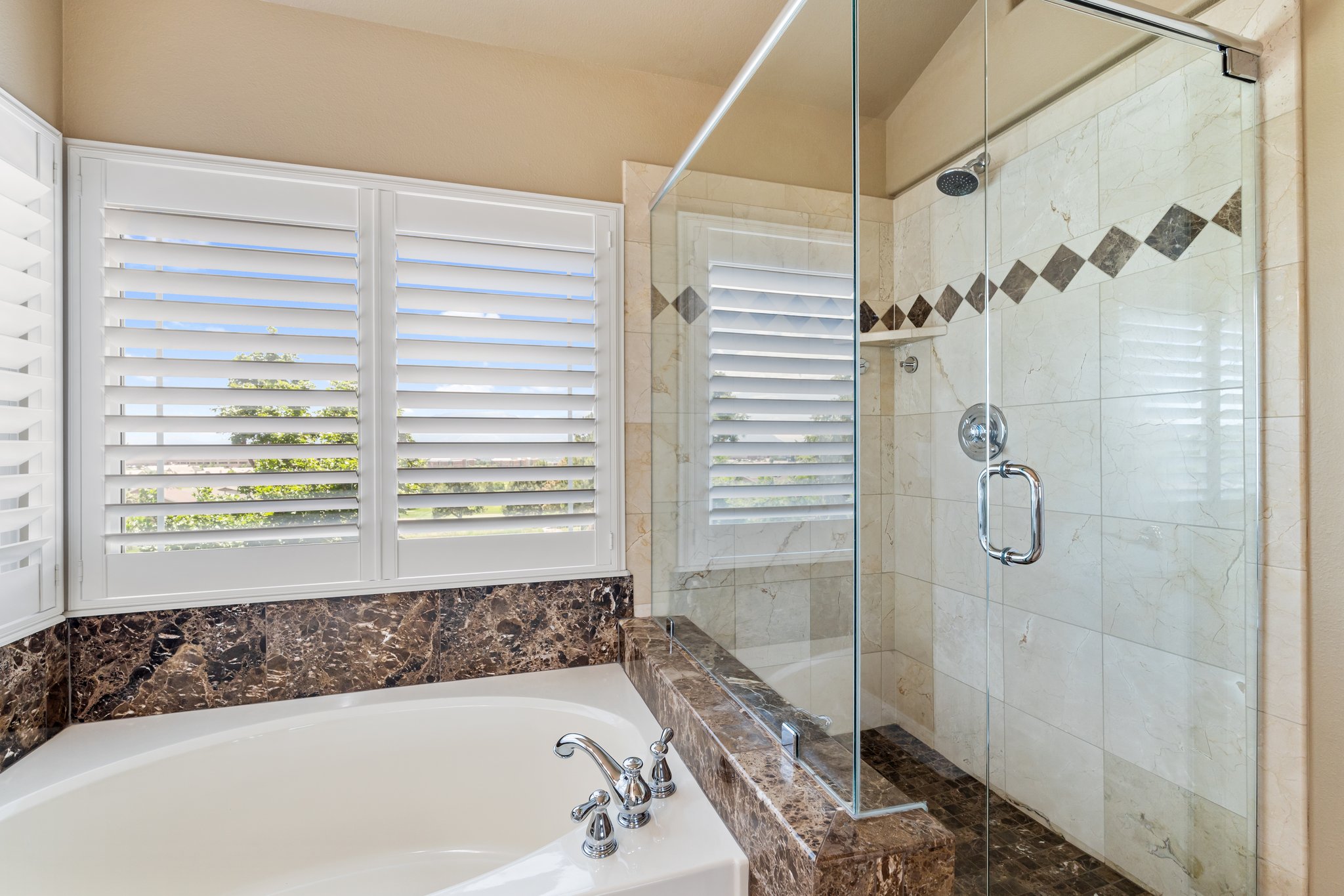 Bright and Spacious Primary Bathroom