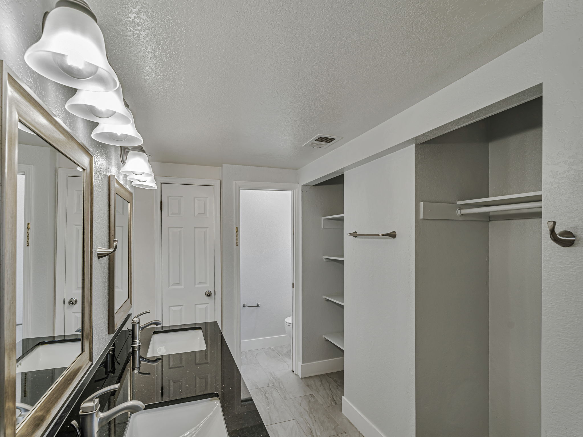 3 Closets in Primary Bathroom