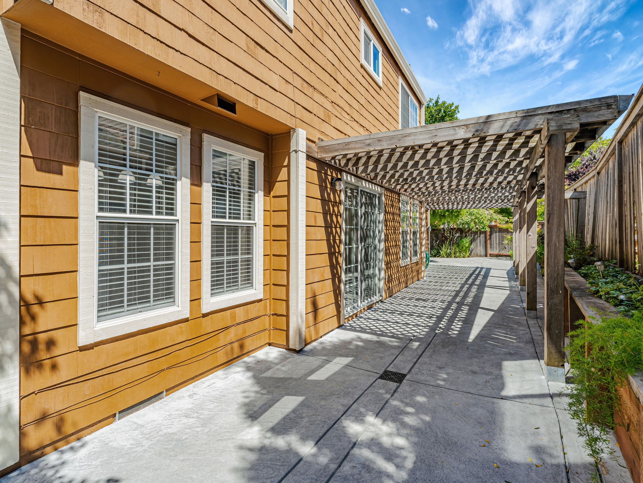 Backyard with patio and low maintenance landscaping