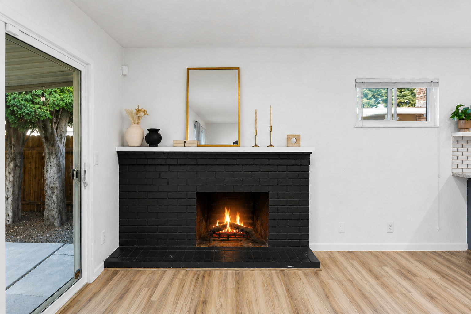 Fire in fireplace has been digitally rendered for illustrative purposes.