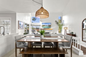 Open floor plan: Dining opens to living room and kitchen