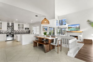 Tall ceilings, bright natural light, and a view of the hills