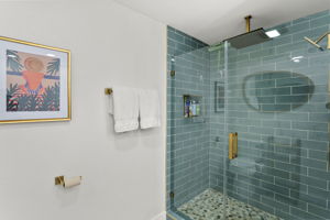 Primary bathroom has been opened up and renovated