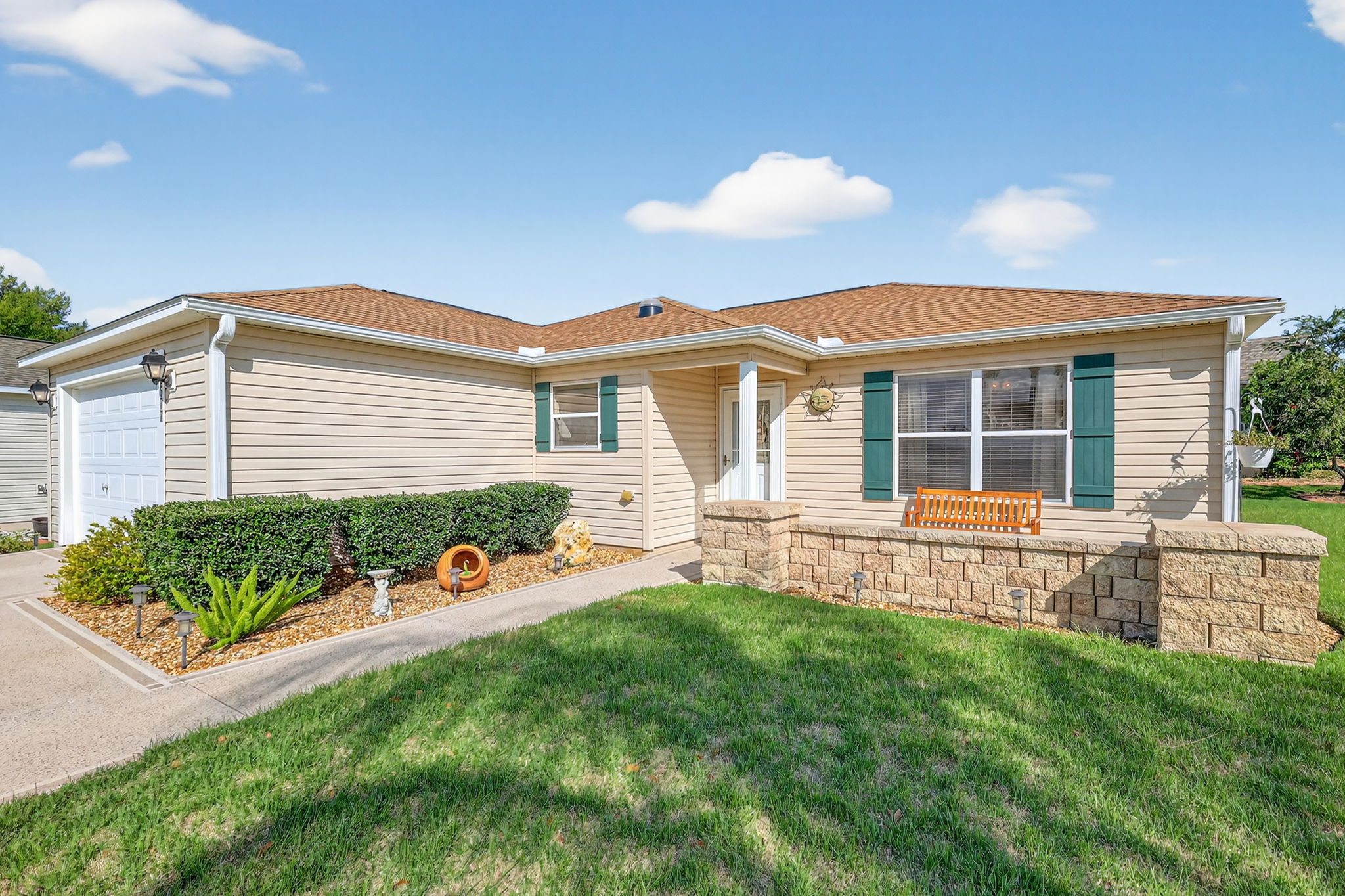 Front Entry and Paver Patio with Seating Wall