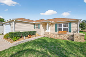 Front Entry and Paver Patio with Seating Wall