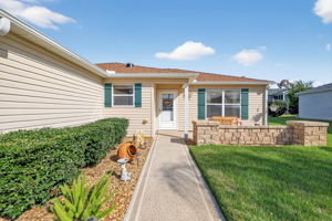 Front Entry and Paver Patio with Seating Wall