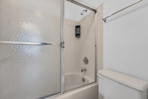 Bath 2- Plate Glass Mirror Mirrored Medicine Cabinet Molded Top with Single Sink/European Vanity/Cabinet Storage Tub-Shower/Ceramic Tile Surround/Privacy Glass Door Ceramic Tile Flooring