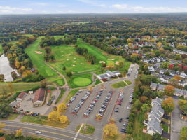 Aerial View- Public Sewer and Water Community Amenities: Outdoor Pool, Tennis Courts This community backs to Quailbrook Golf Course