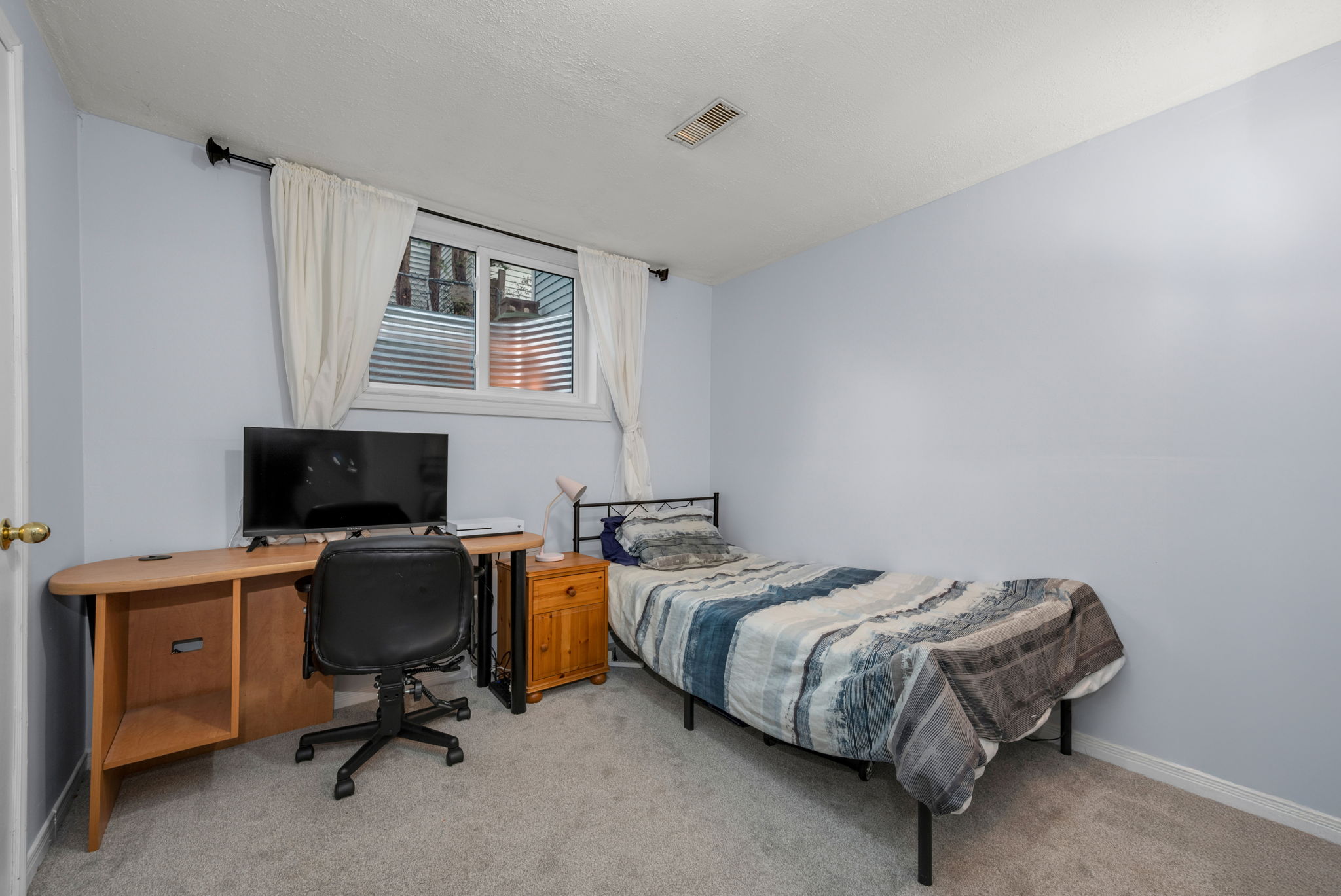 Basement bedroom #1 with egress window