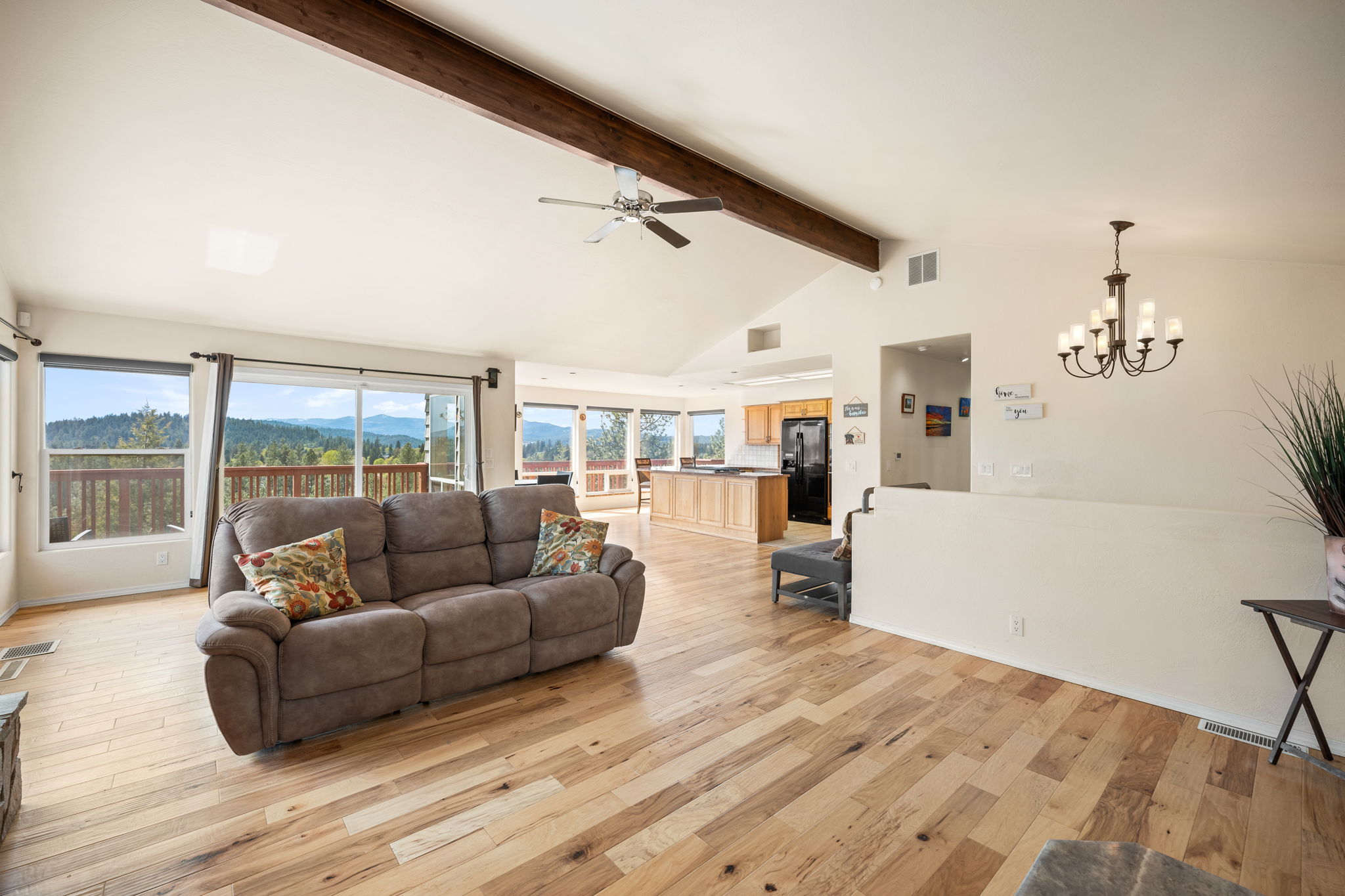 Open Floor Plan - Slider and wall of windows to enjoy your view!