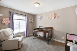3rd bedroom with overhead lighting