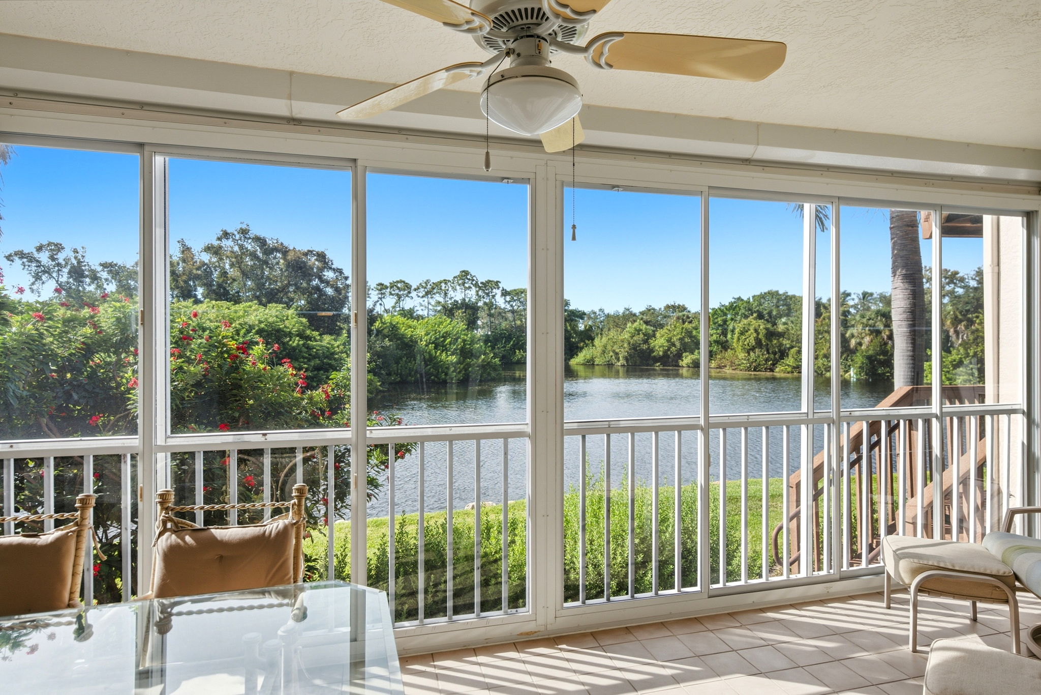 Large lanai with weather protection with hurricane shutters and plexiglass enclosure