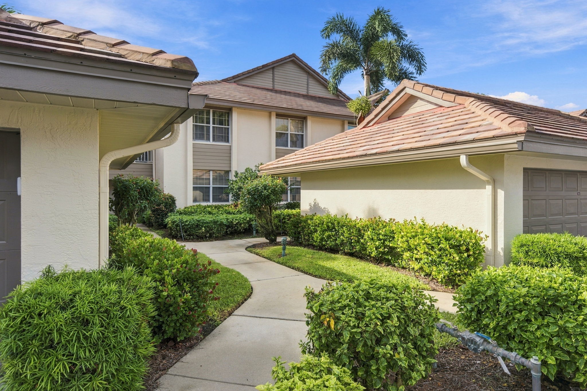 Walk way  - separate 2 car garage included with condo