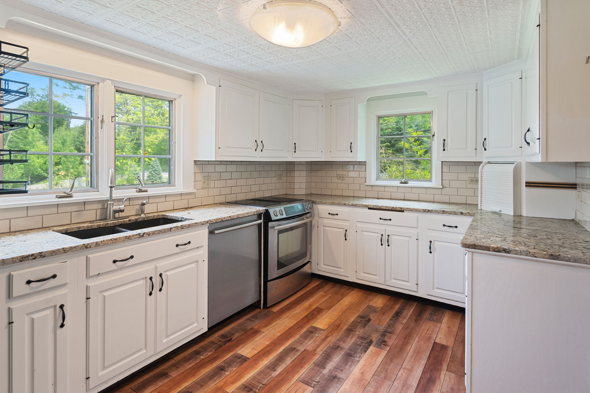 View of kitchen with 2 window exposures