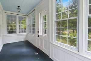 Enclosed finished front porch with heat!