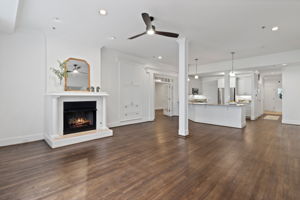 Open Concept living at it's finest, featuring 10' Ceilings, newly refinished hardwood floors, gas fireplace, new ceiling fans, fresh paint, and expansive granite peninsula and luxury kitchen perfect for entertaining