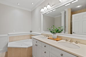 Primary Bathroom with Dual Vanity, Frameless Glass Shower and Garden Tub