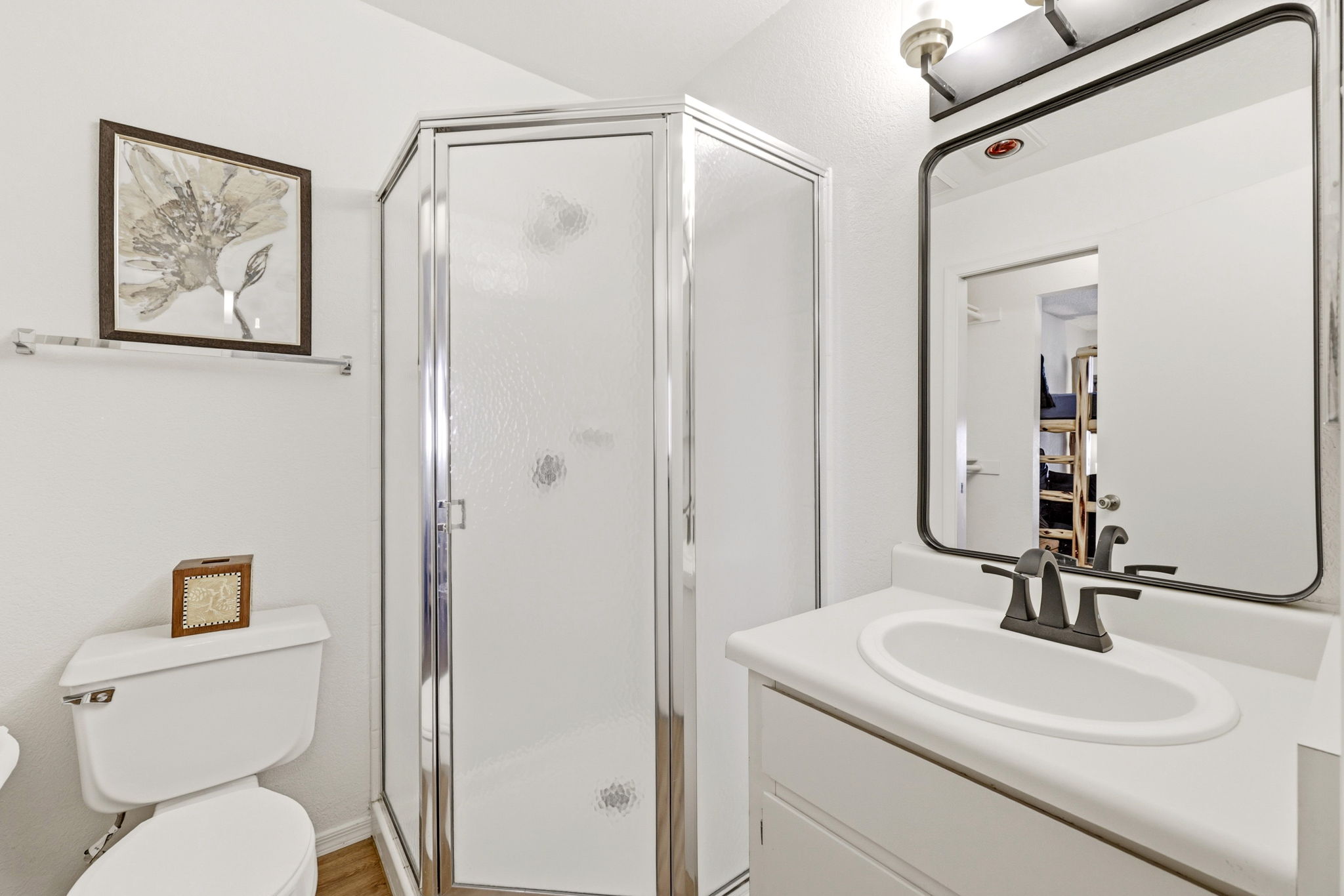 Full bathroom with walk-in shower on the main level.