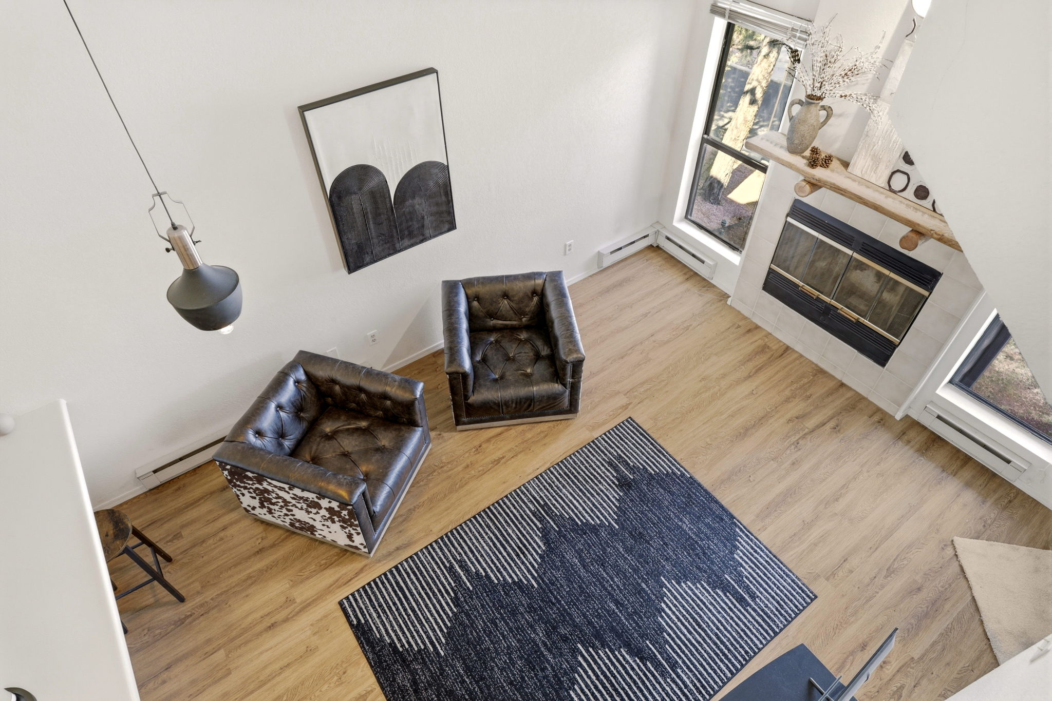 Overlook the living space from the elevated loft above.