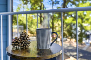 Private balcony perfect for morning coffee surrounded by the pines.