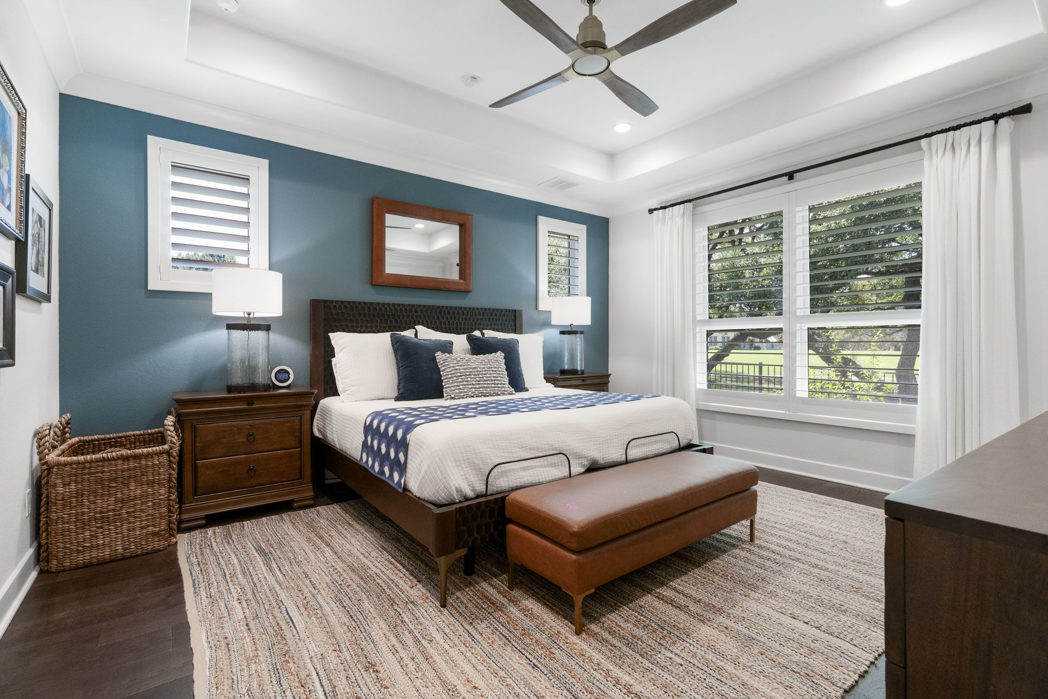 Owner's retreat has a beautiful views of mature oak trees.