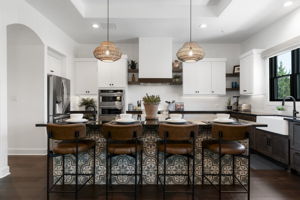 Step inside to designer features throughout, including a kitchen a chef would love!