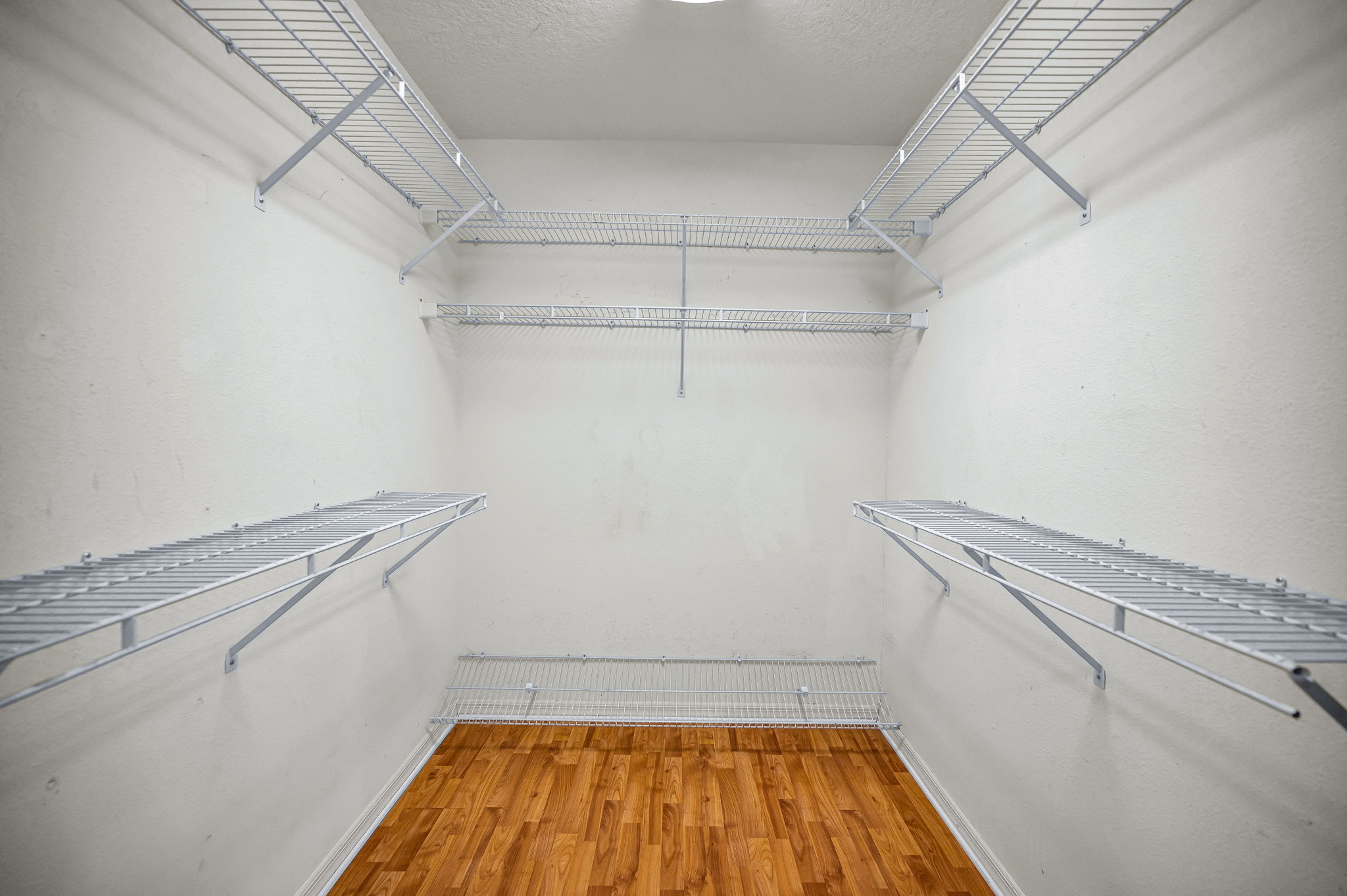 Primary Bedroom Walk-in Closet1