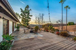 Patio off the back of the house - office and Game Room