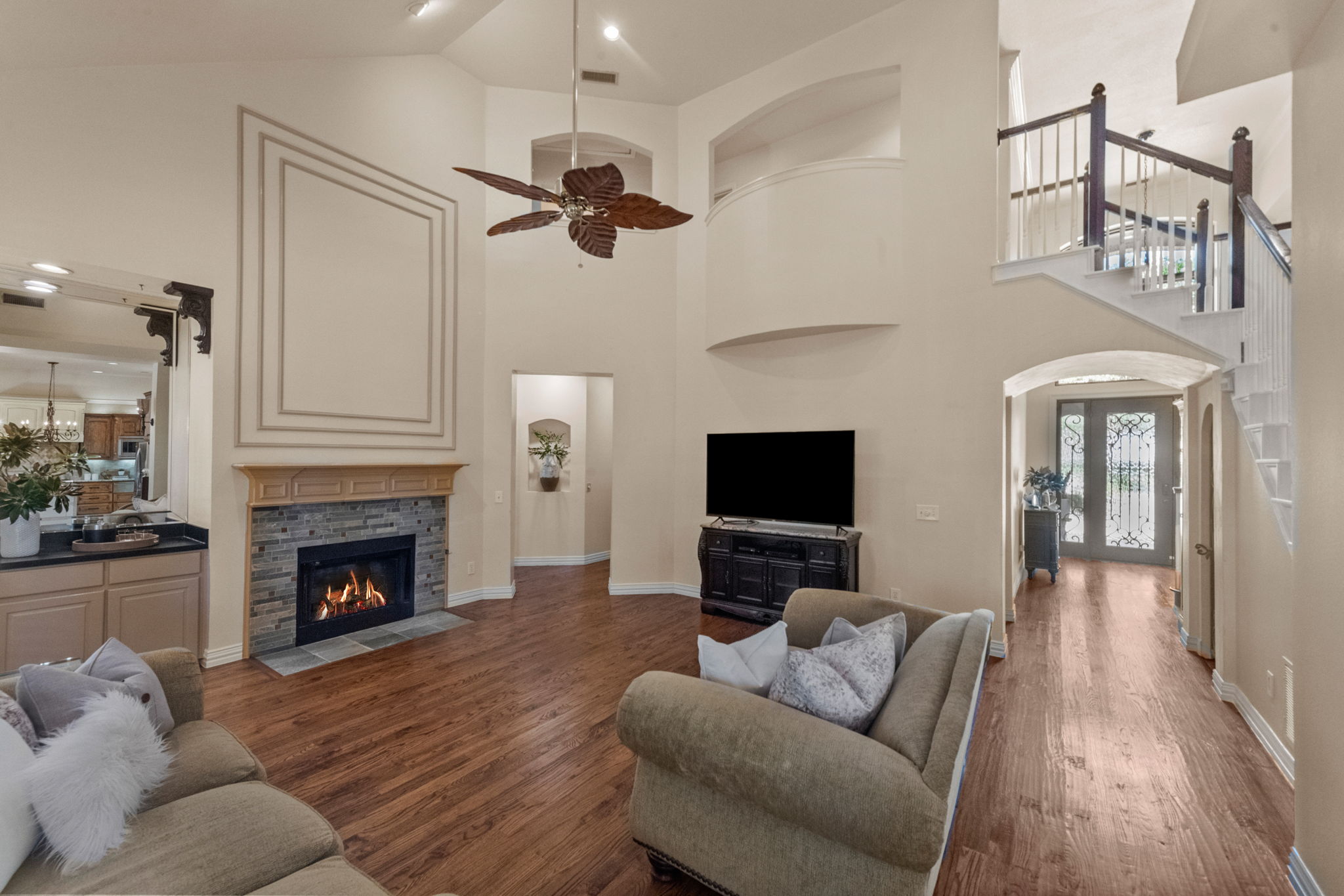 The high ceiling and other features add character to the family room.