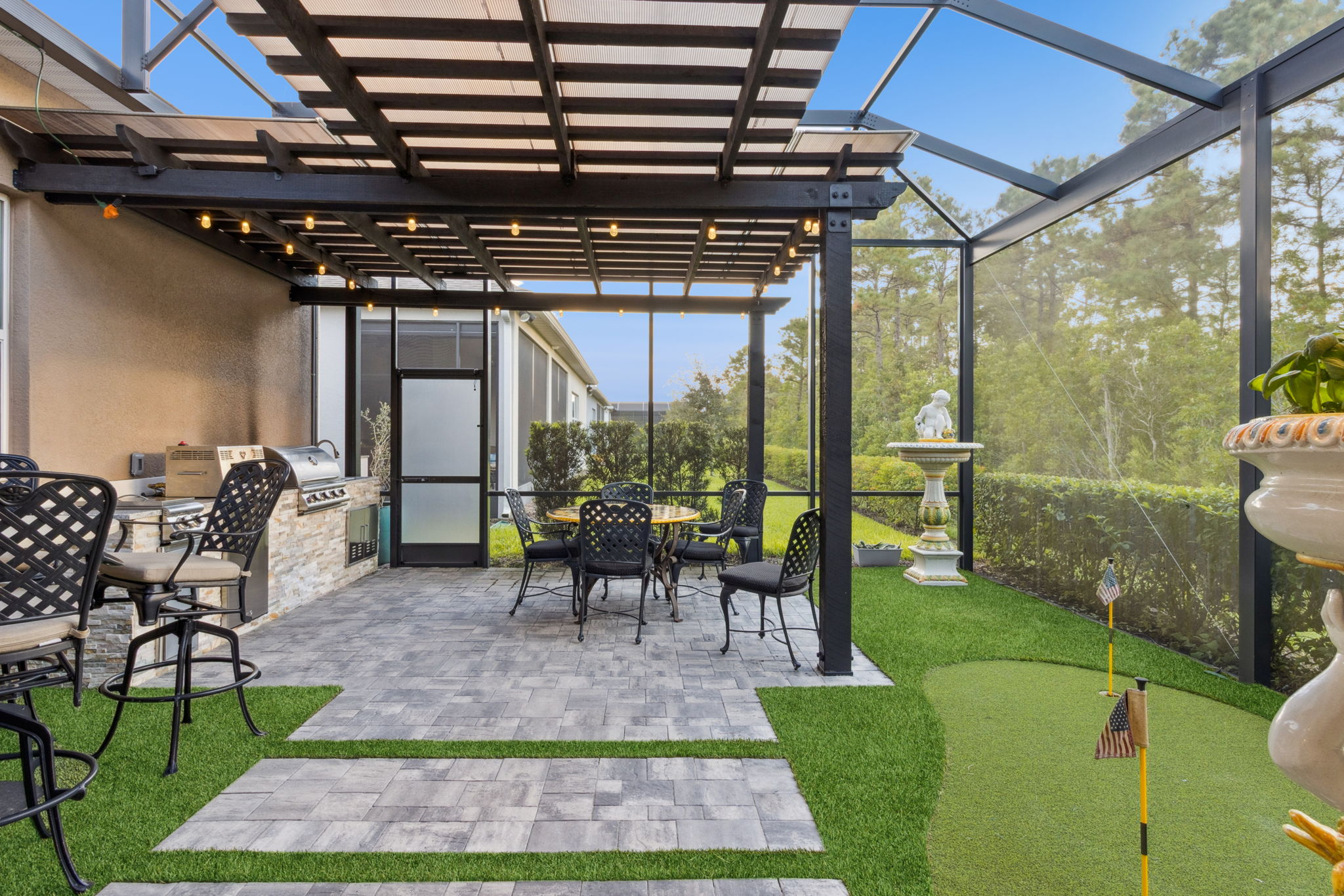 outdoor screened lanai and kitchen