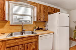 Kitchen sink overlooks private back yard