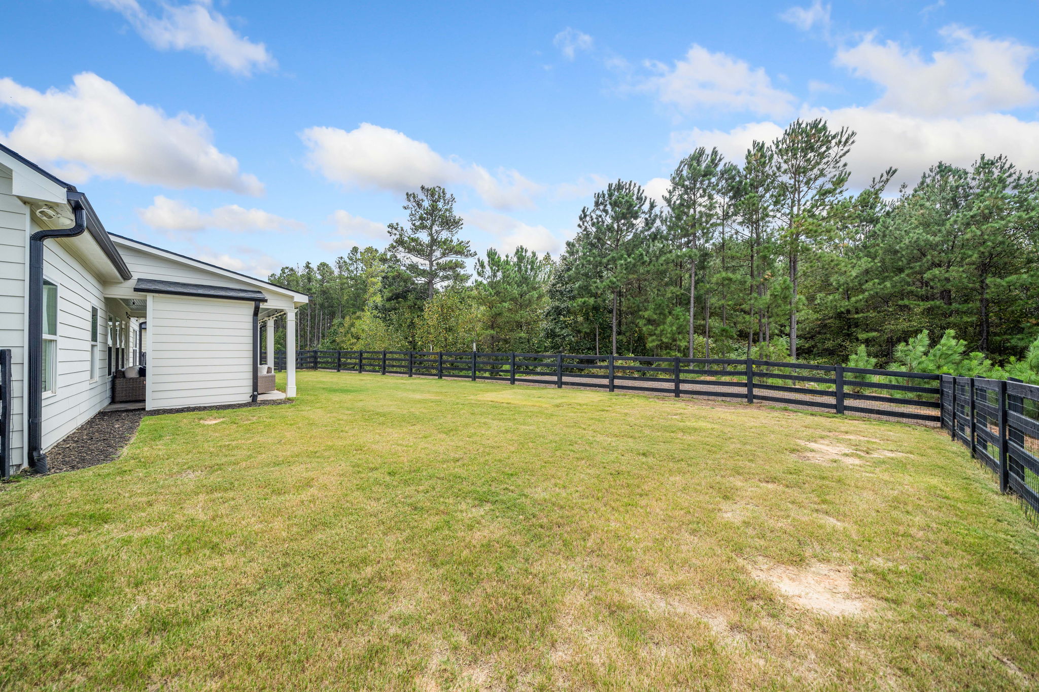 Fenced Large Level Back Yard