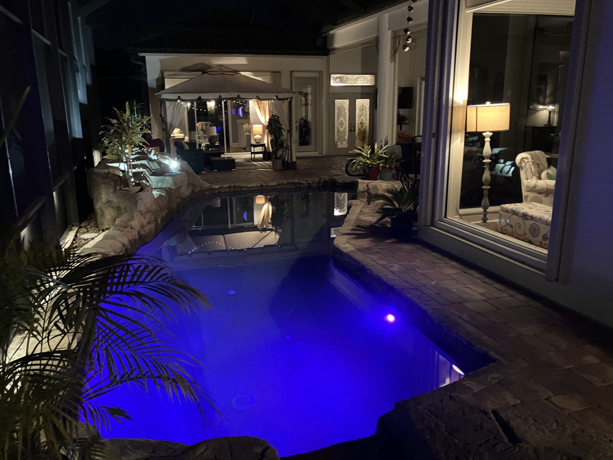 Night time pool photo-27500 Riverbank Dr.