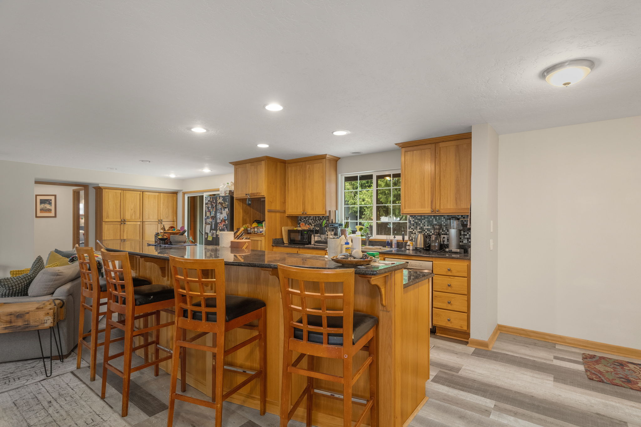 Kitchen with large island bar