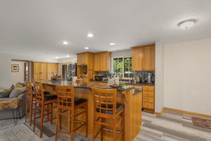 Kitchen with large island bar