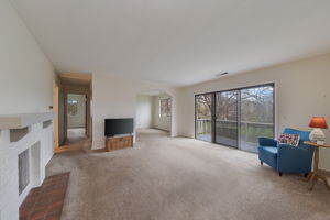 Large Living Room With Access to Balcony