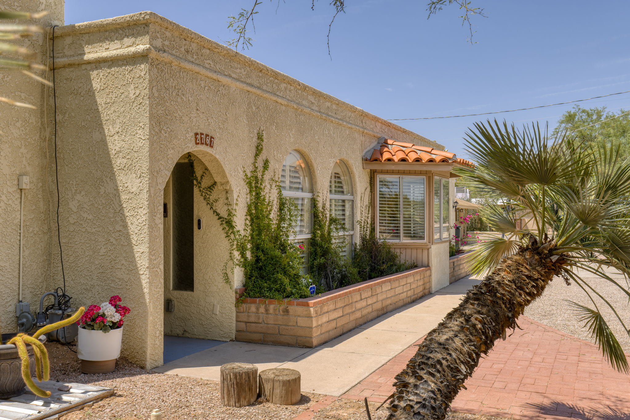 Sidewalk and raised flower beds