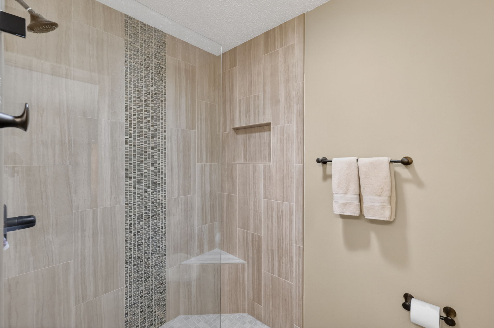 Primary Bathroom TILED WALK-In shower with frameless glass