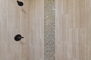 Primary Bathroom TILED WALK-In shower with frameless glass