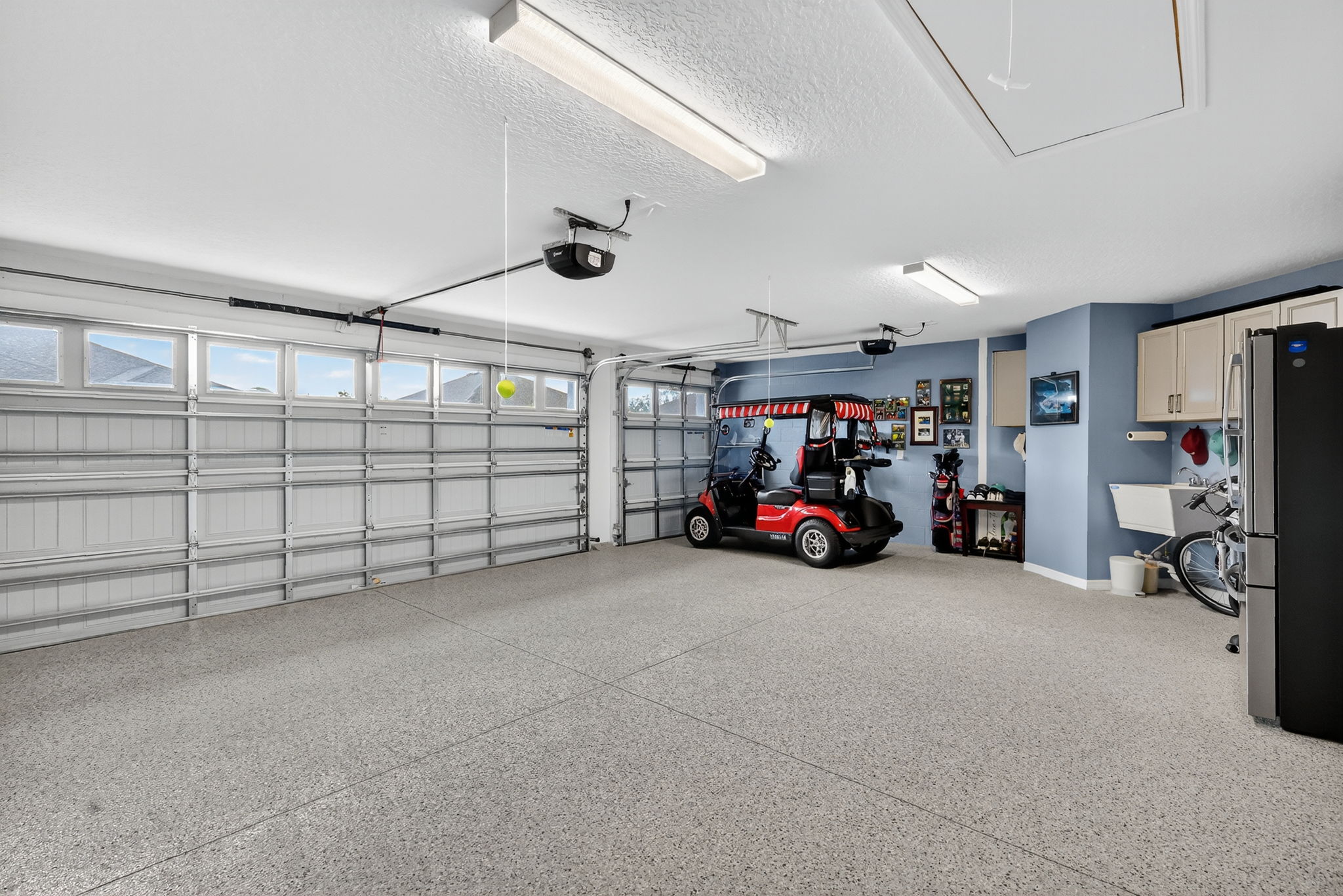Expansive 2 Car + Golf Cart Garage