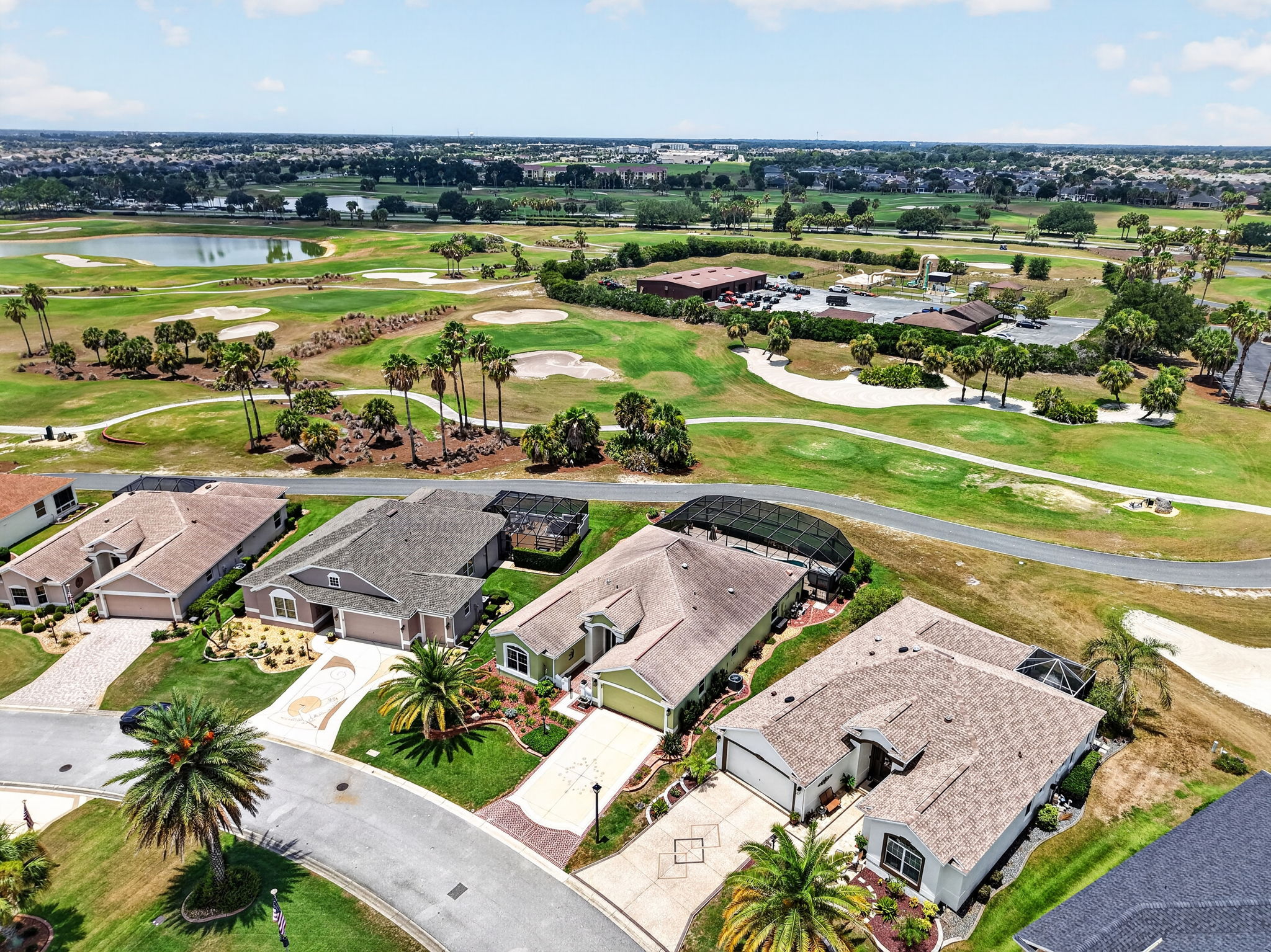 Aerial Front and Side Elevation with Golf Front Views