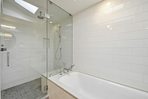 Spacious shower & soaking tub