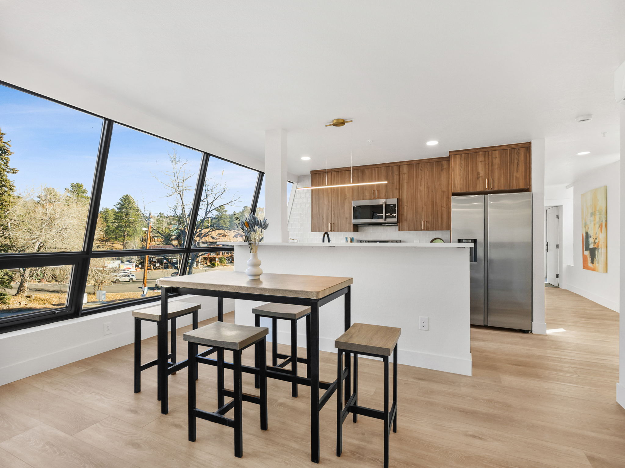 Seamless flow from living room to kitchen.