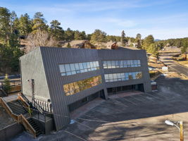 Parking and entry way located in both the front and back of the building.