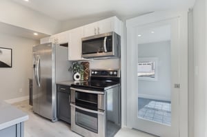 Kitchen w/Pocket Door to Sunroom