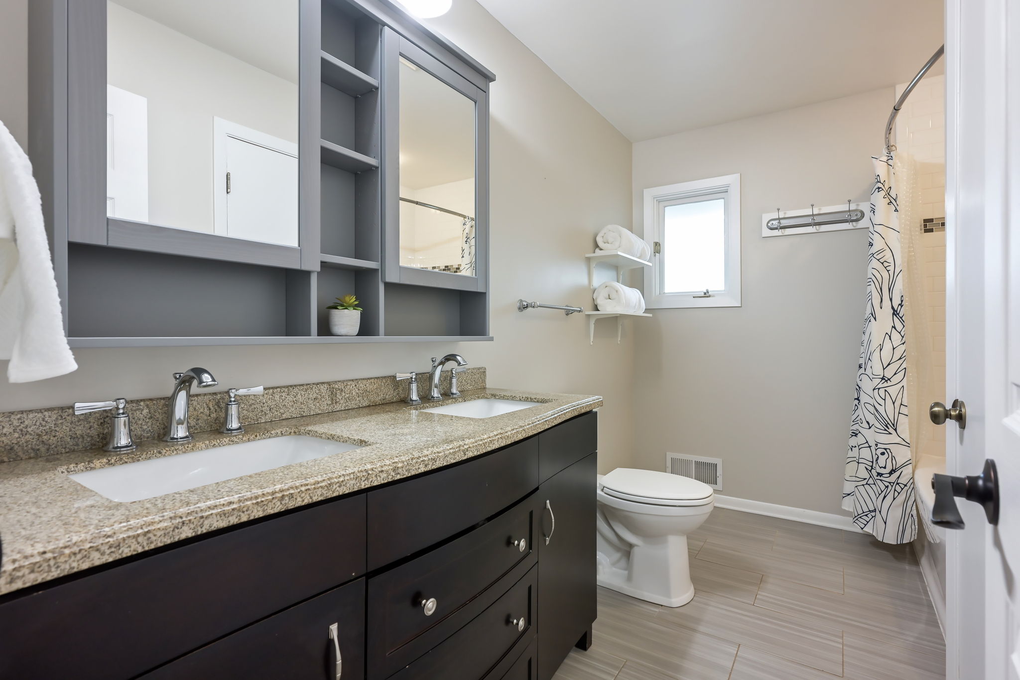 Full Bathroom with plenty of storage, including a linen closet located inside the bathroom.