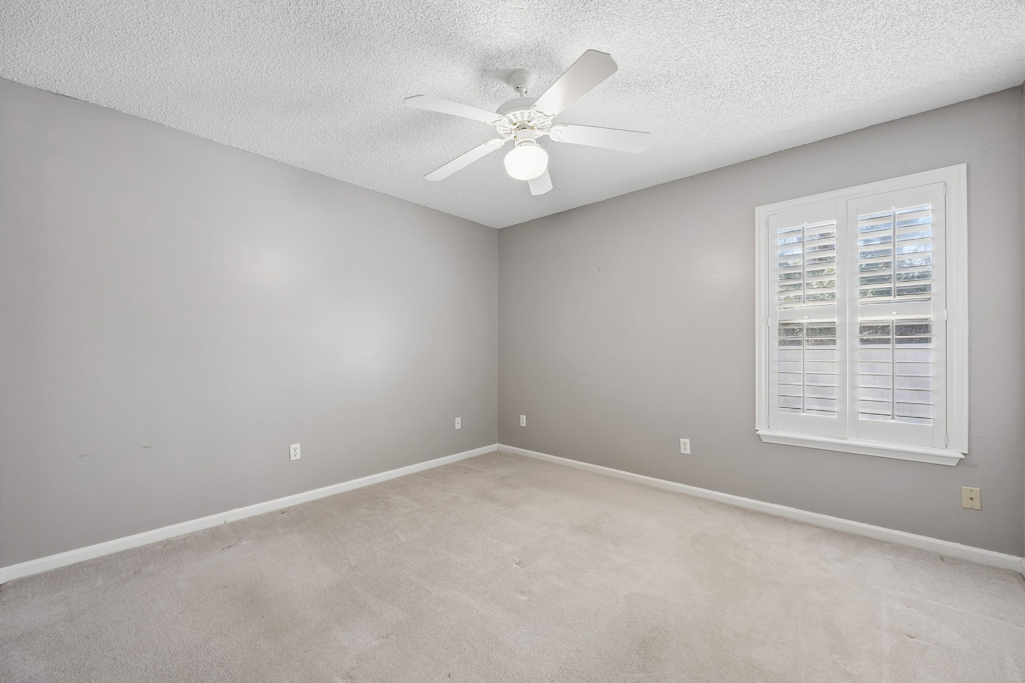 Bedroom 2 has backyard views and...