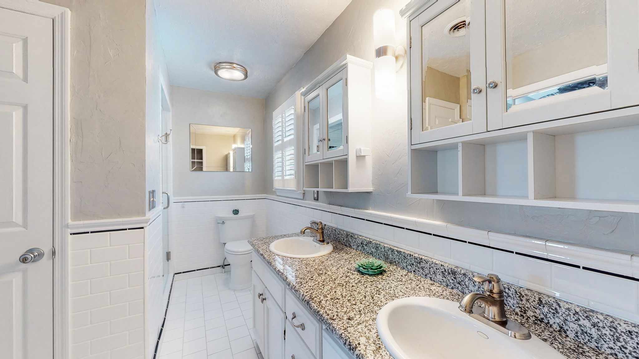 Enjoy your private master bath with a linen closet, separate sinks and plenty of storage.