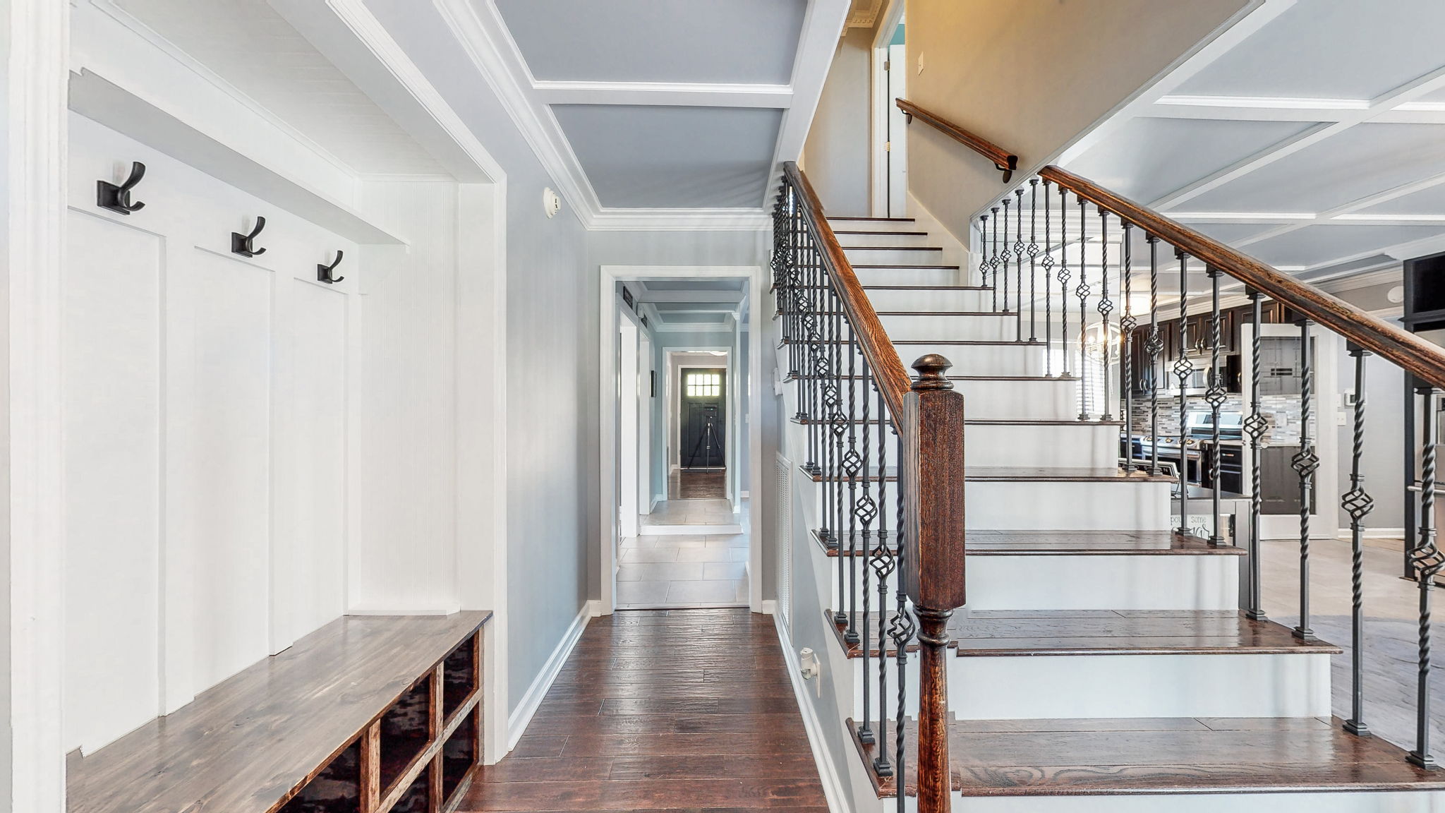 A welcome entry closet with bench invites you into this amazing home.