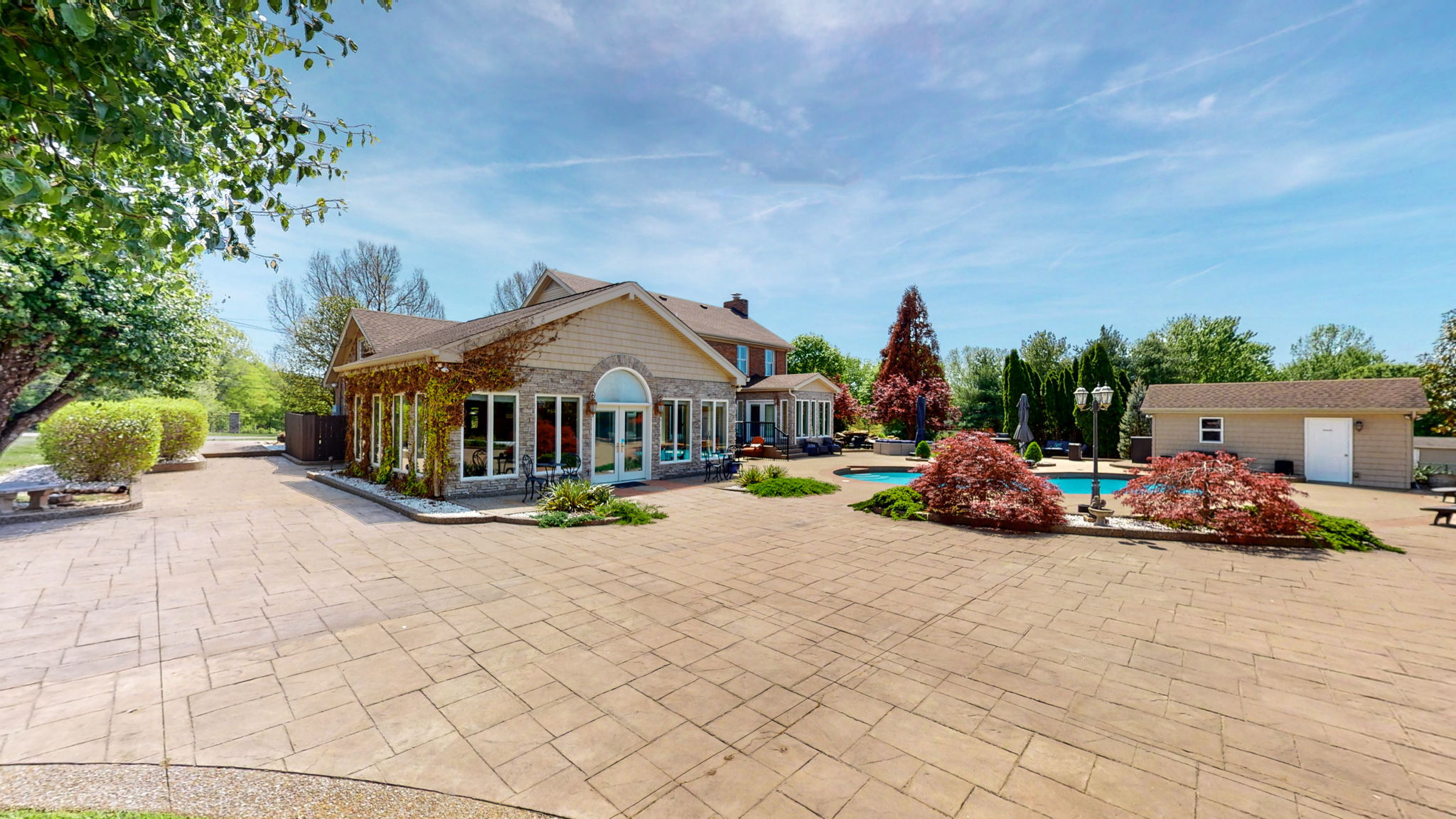 Moving to the incredible backyard... Let the entertaining begin.. ..a live band, family and friends for a pool party!!